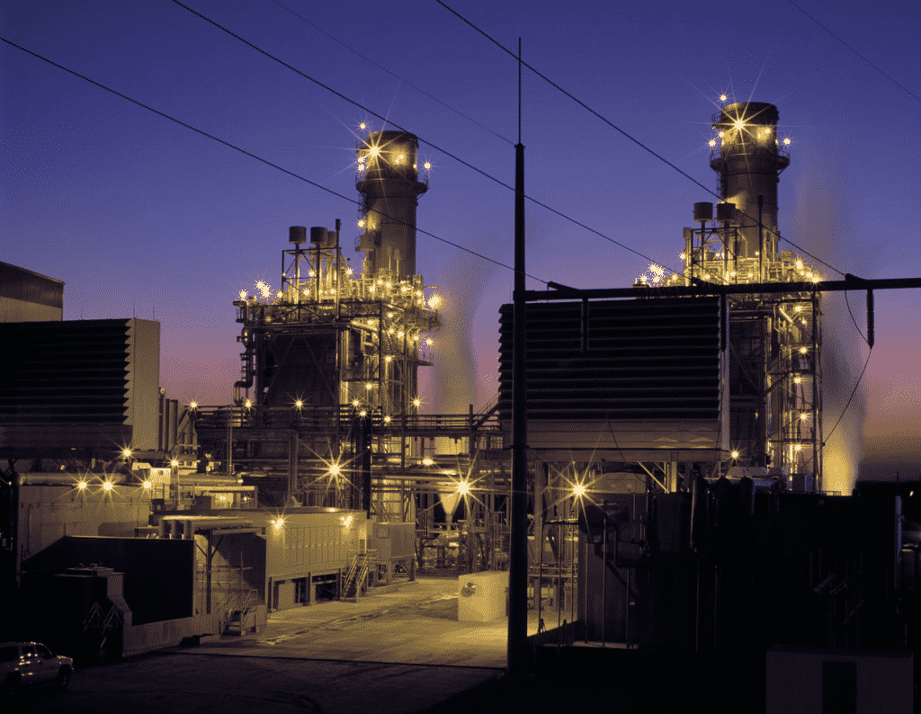 Factory building lit up at night
